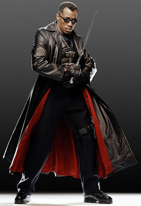 Wesley Snipes as Blade wearing a leather trench coat